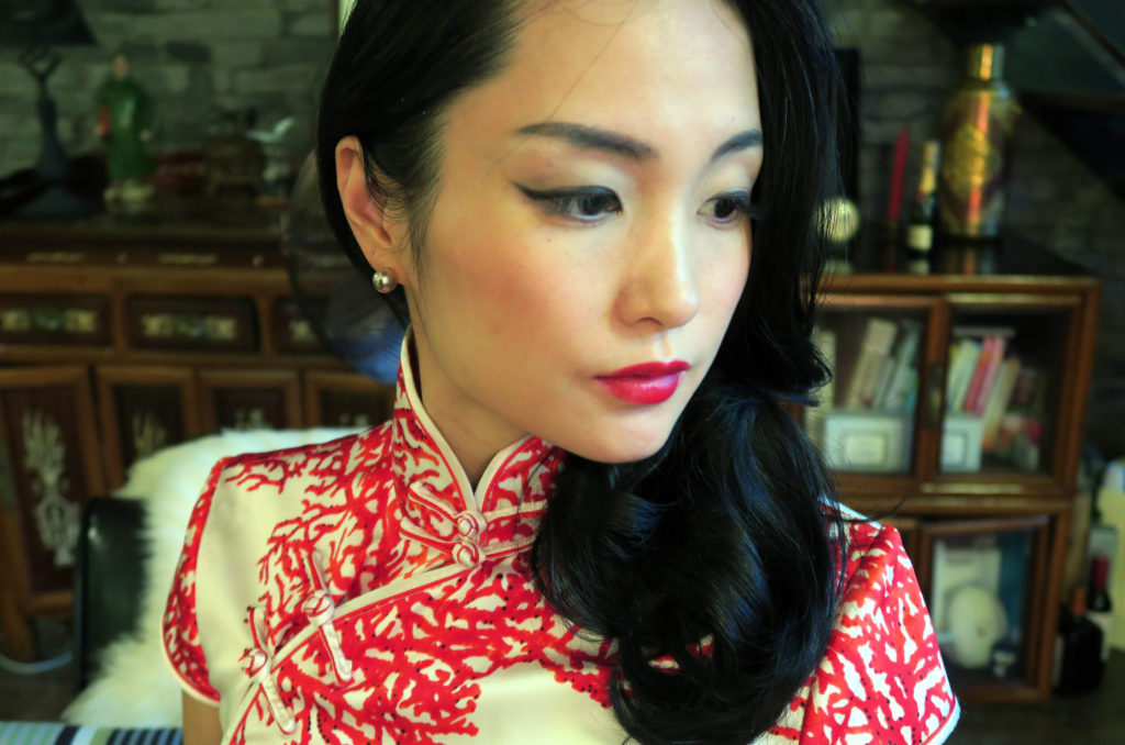 This is me in my first Shanghainese qipao (or cheongsam), in gorgeous red and white print. In my traditional Shanghainese lane house apartment. 