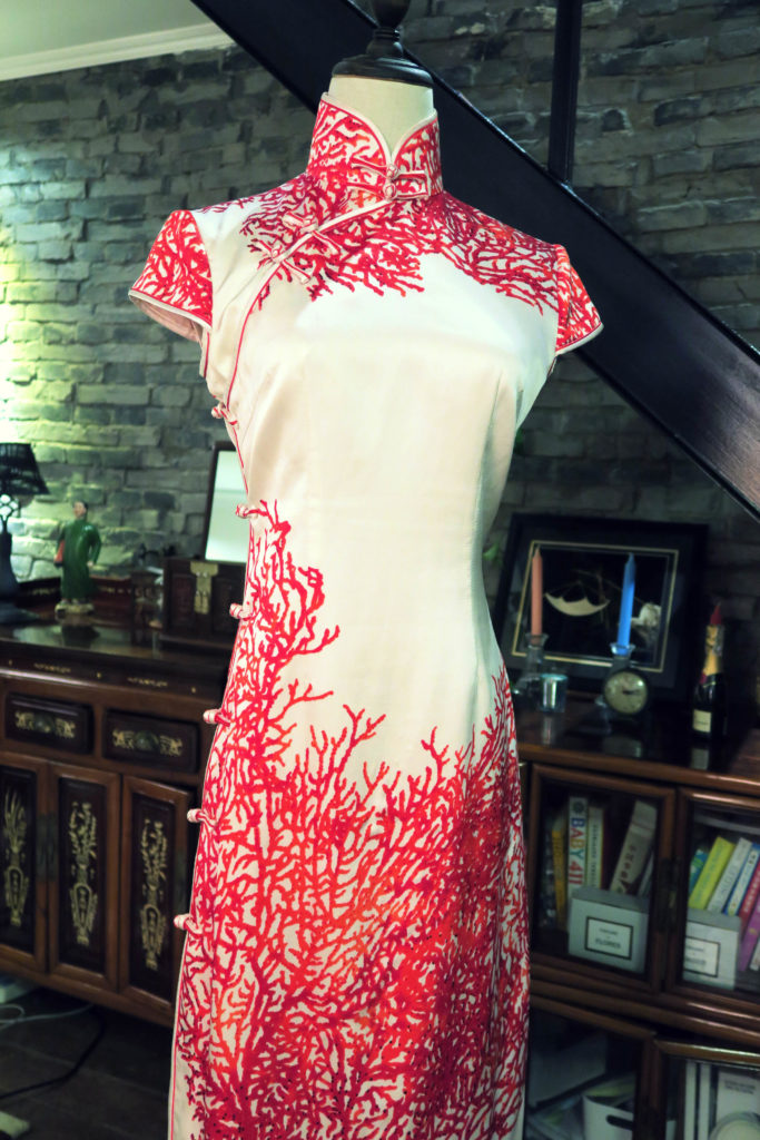 The front of the qipao. The length of the dress is just below knee length.