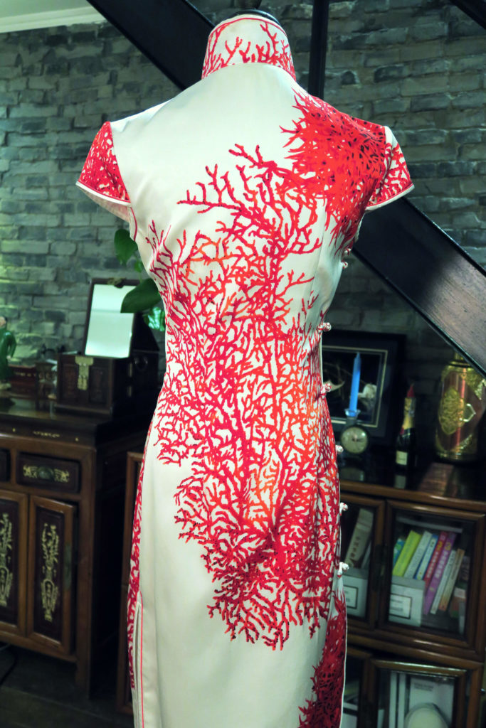 The back of the qipao. I like the variation in the red print between front and back.
