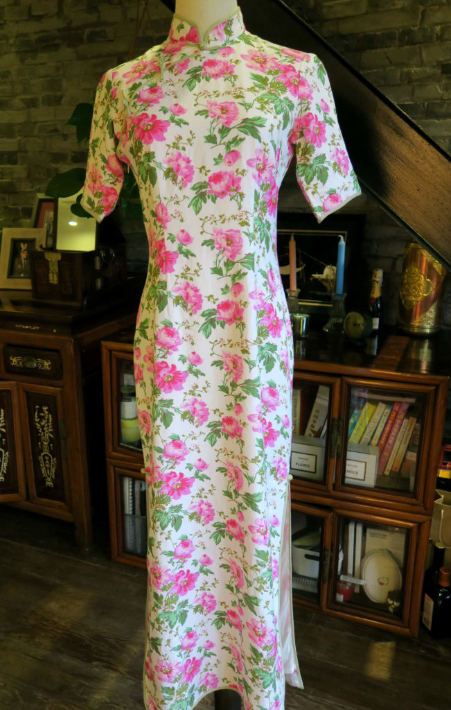 The full front view of the magenta floral qipao.