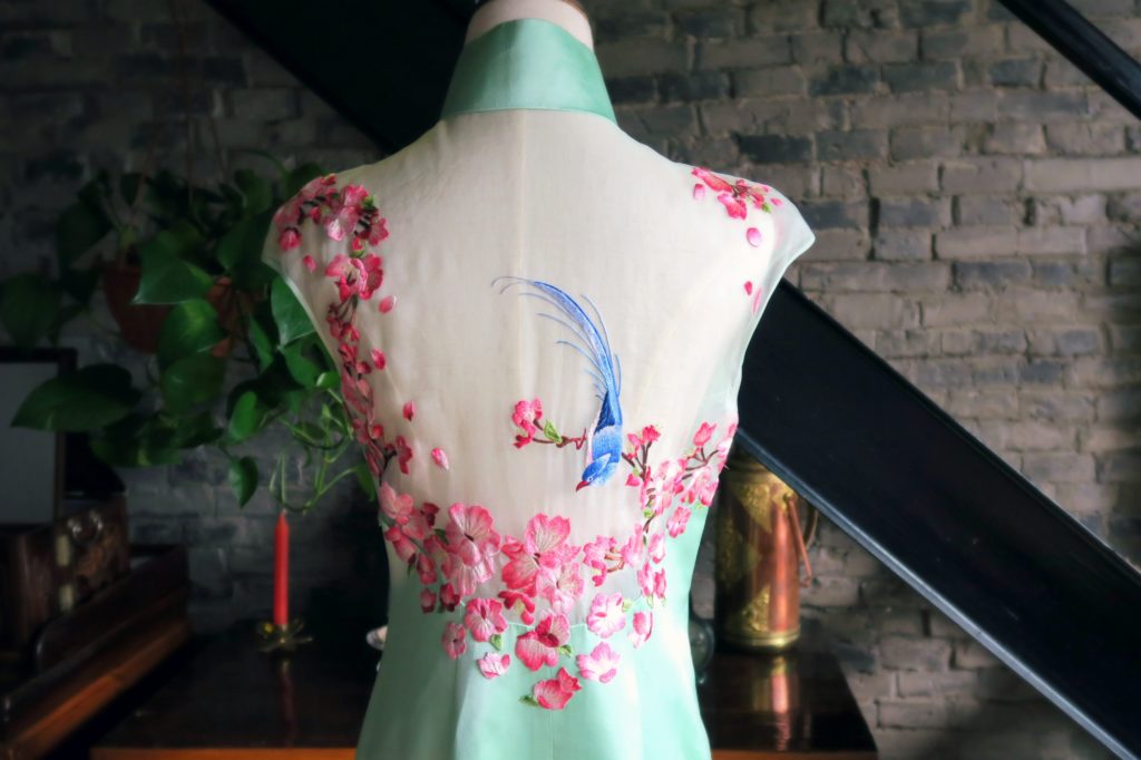 The amazing floral and bird embroidery on the back of my modern wedding qipao. 