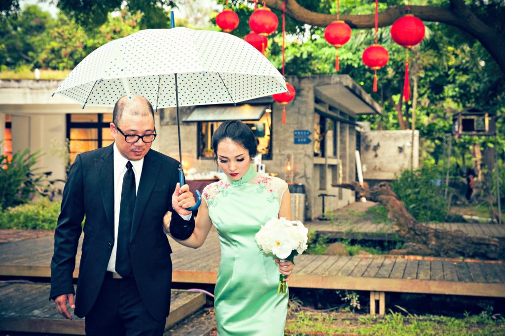 One of the few nicer photos from our photographer. It started raining just as our outdoor reception started, which was sad but also kind of picturesque. 