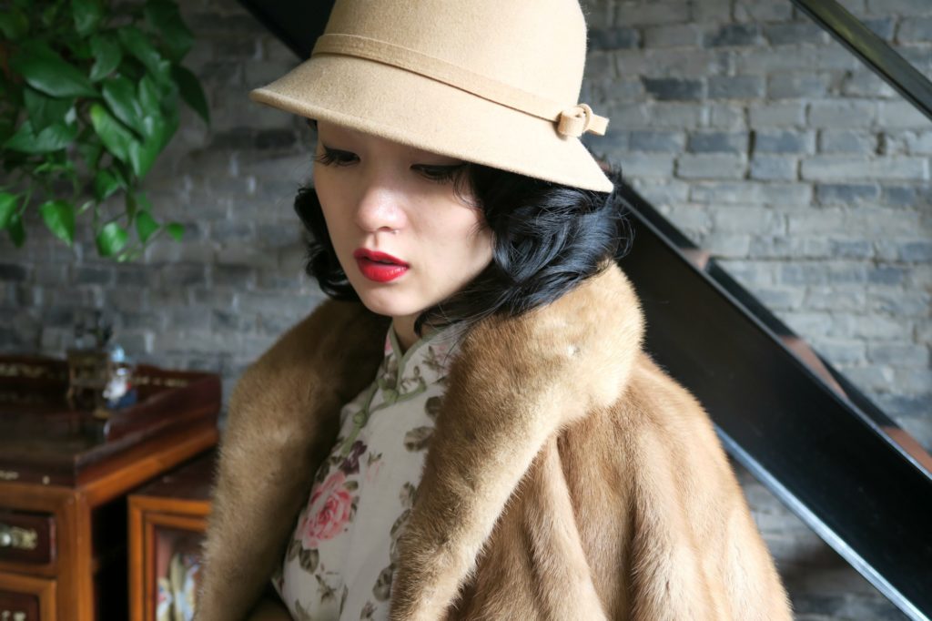 Wearing a qipao with my vintage fur jacket and wool bucket hat