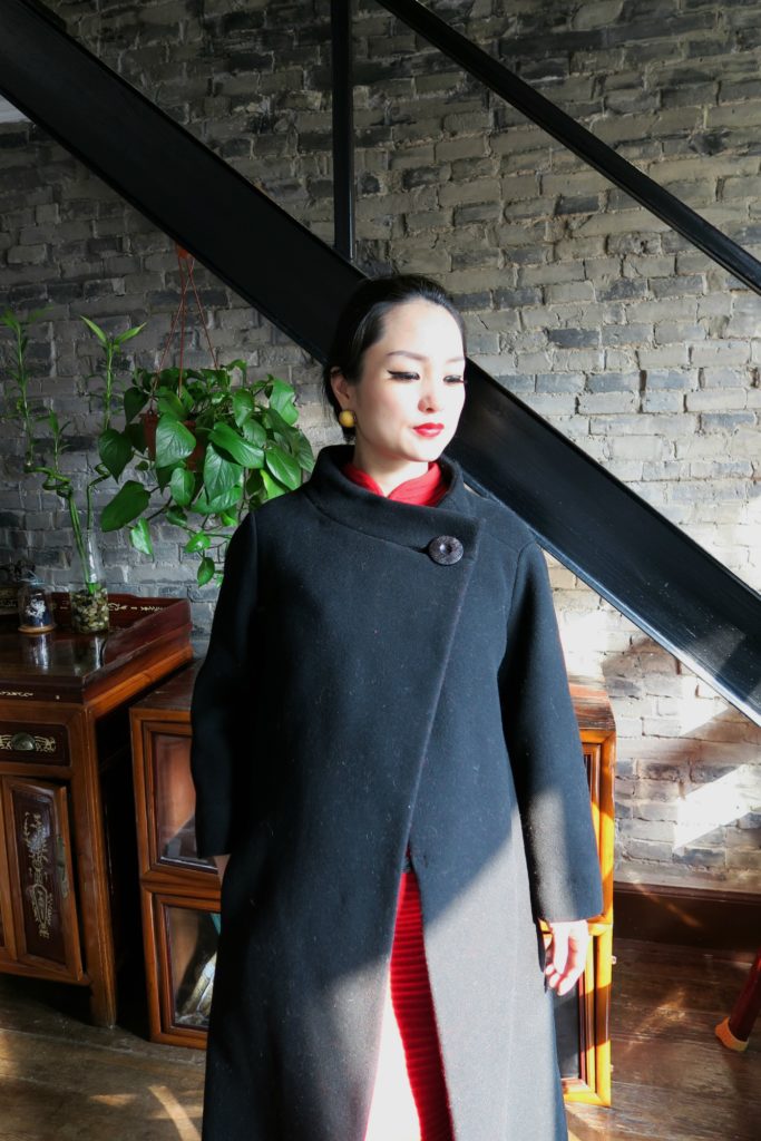 Red stretch wool qipao with vintage 1950s Dior coat