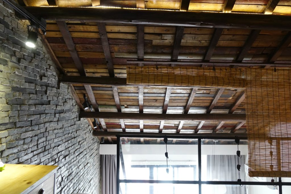 Ceiling boards and bare brick wall of my old Shanghai style lane house apartment