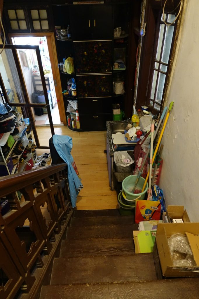 Crowded staircase of an old Shanghai lane house apartment