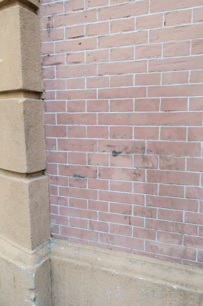 Painted bricks on the facade of old Shanghai lane houses