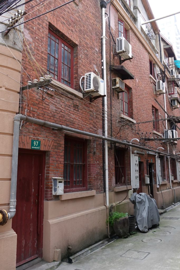 Red brick walls of Old Shanghai lane house apartment
