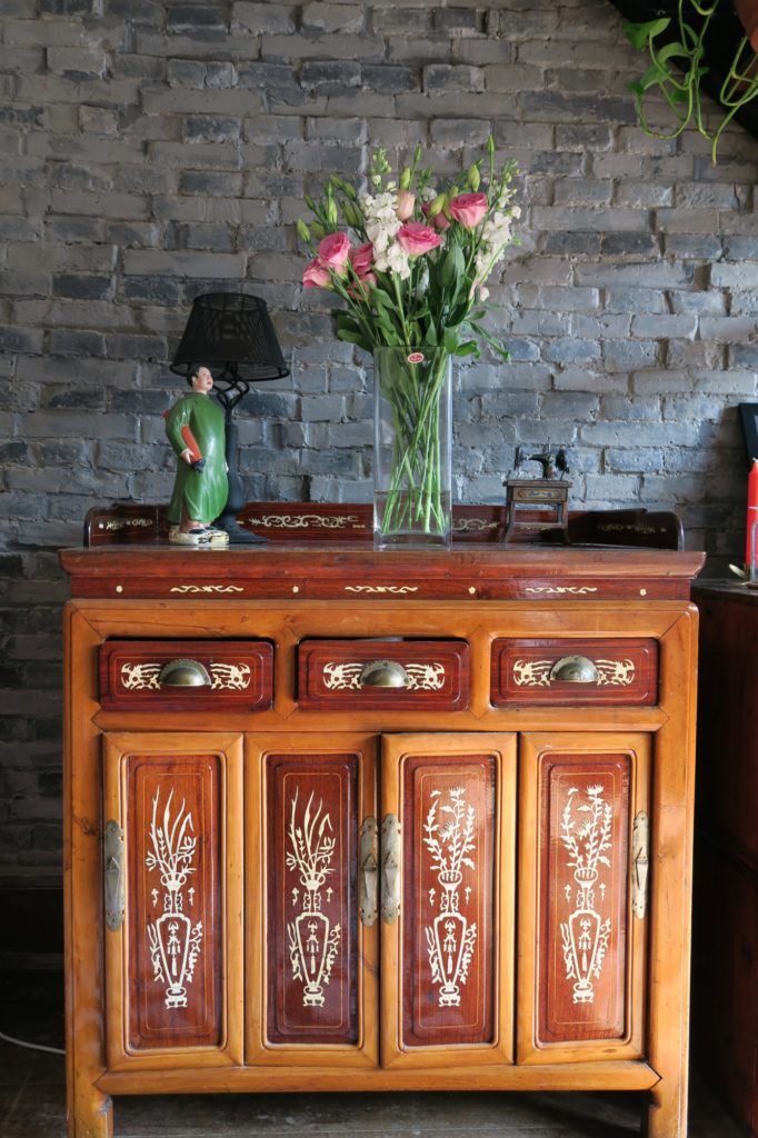 Antique Chinese sideboard with wooden inlay