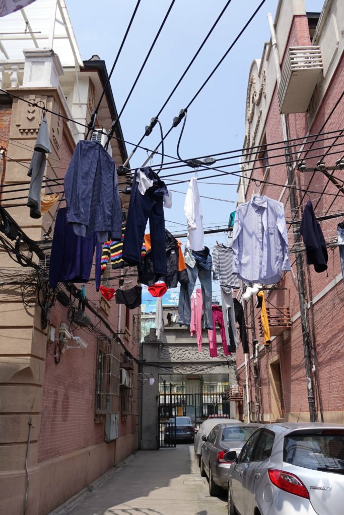 Clothes hanging in a traditional Shanghai lilong