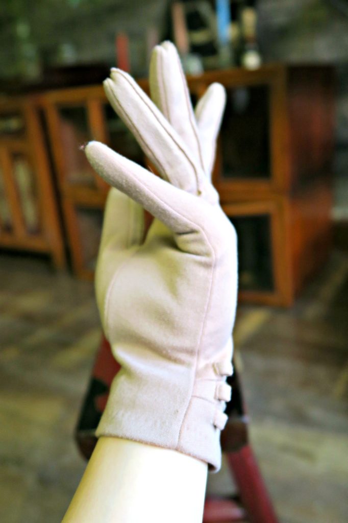 Vintage pastel salmon wrist gloves side view
