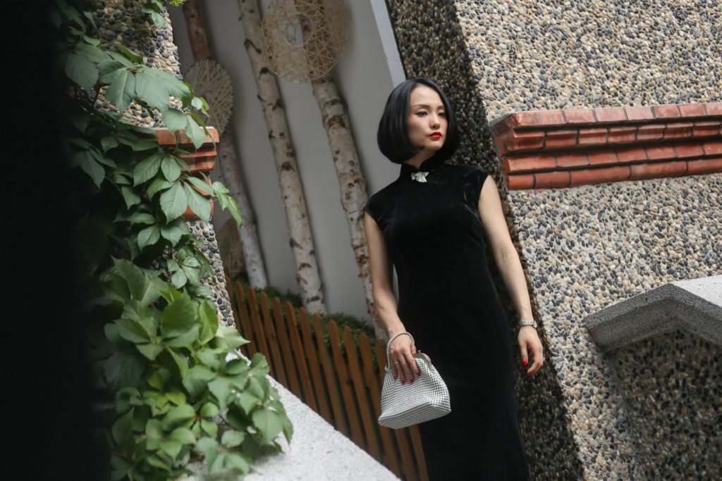 Miranda wearing black sleeveless velvet qipao Sinan Mansions Steps 2