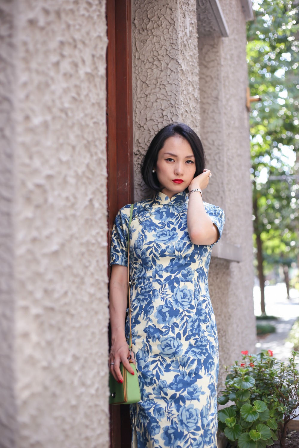 Wearing Blue and white qipao at Sinan Mansions Shanghai front view