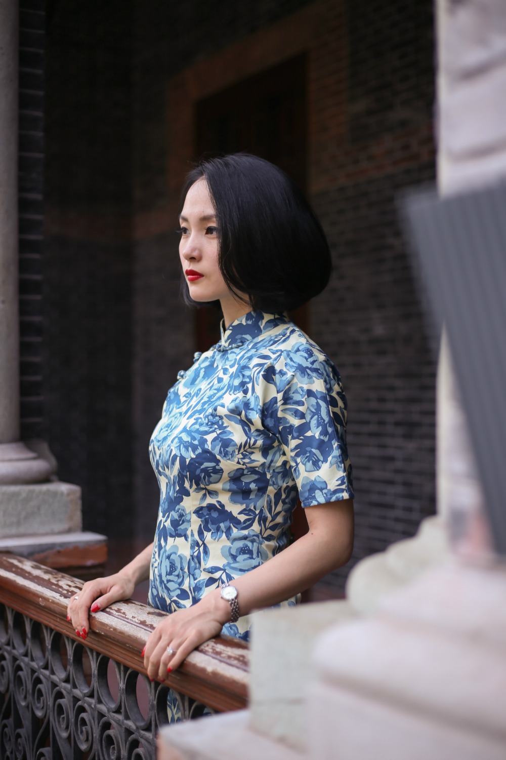 Wearing Blue and white qipao at Sinan Mansions Shanghai side view