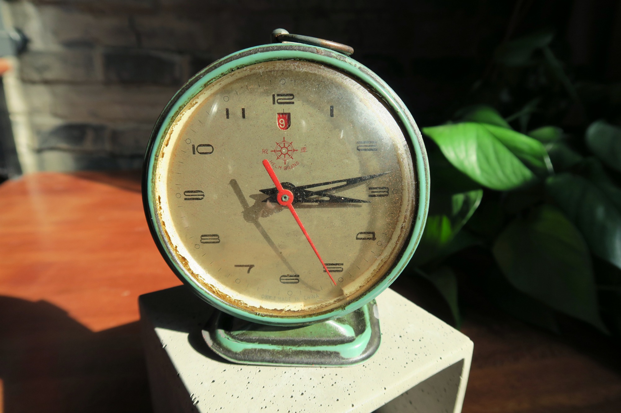 Close up view of vintage 60s Helm brand alarm clock