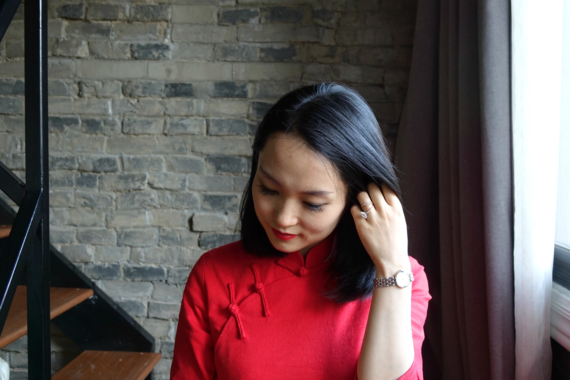 A long bob with a red qipao (cheongsam)