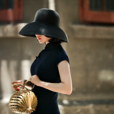 Cotton viscose navy cap sleeve qipao with black hat and bamboo bag