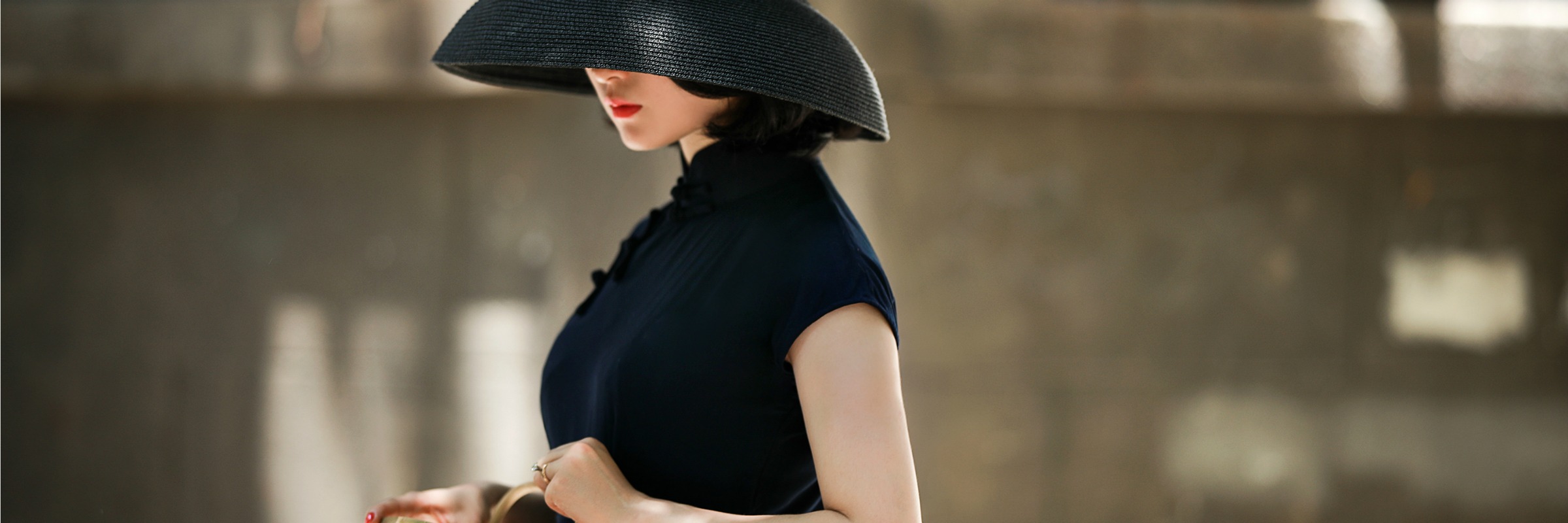 Navy qipao with straw hat and bamboo bag – website main 3